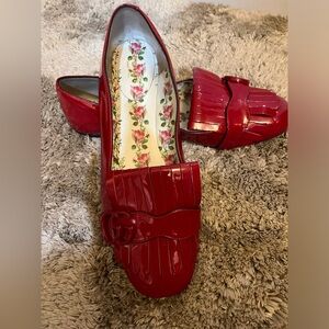 Beautiful red patent leather Gucci loafers.